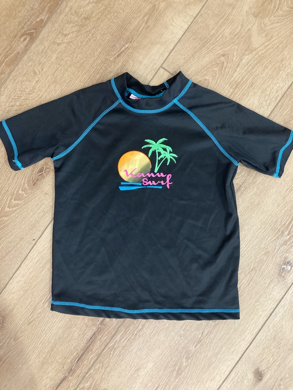 Girls size 10 black palm graphic short sleeved rash guard swim top